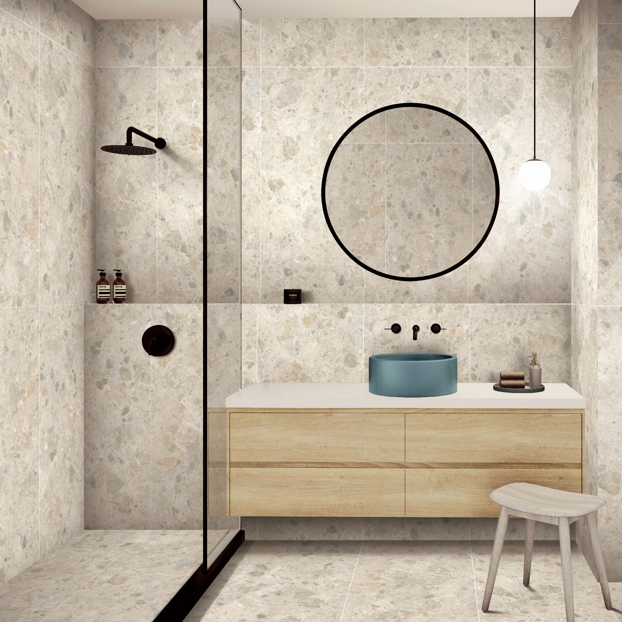 Modern bathroom renovation with tiled walls and floor