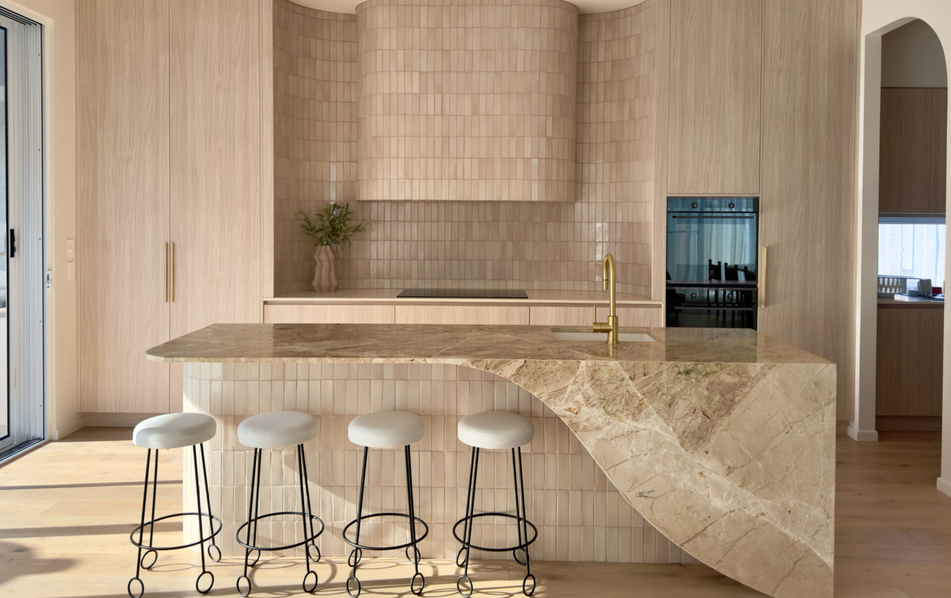 Kitchen with tiled splashback